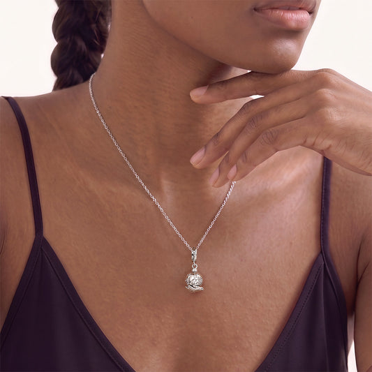 Gnoce Holding A Rotating Earth Charm Platinum-plated Silver Blend_3