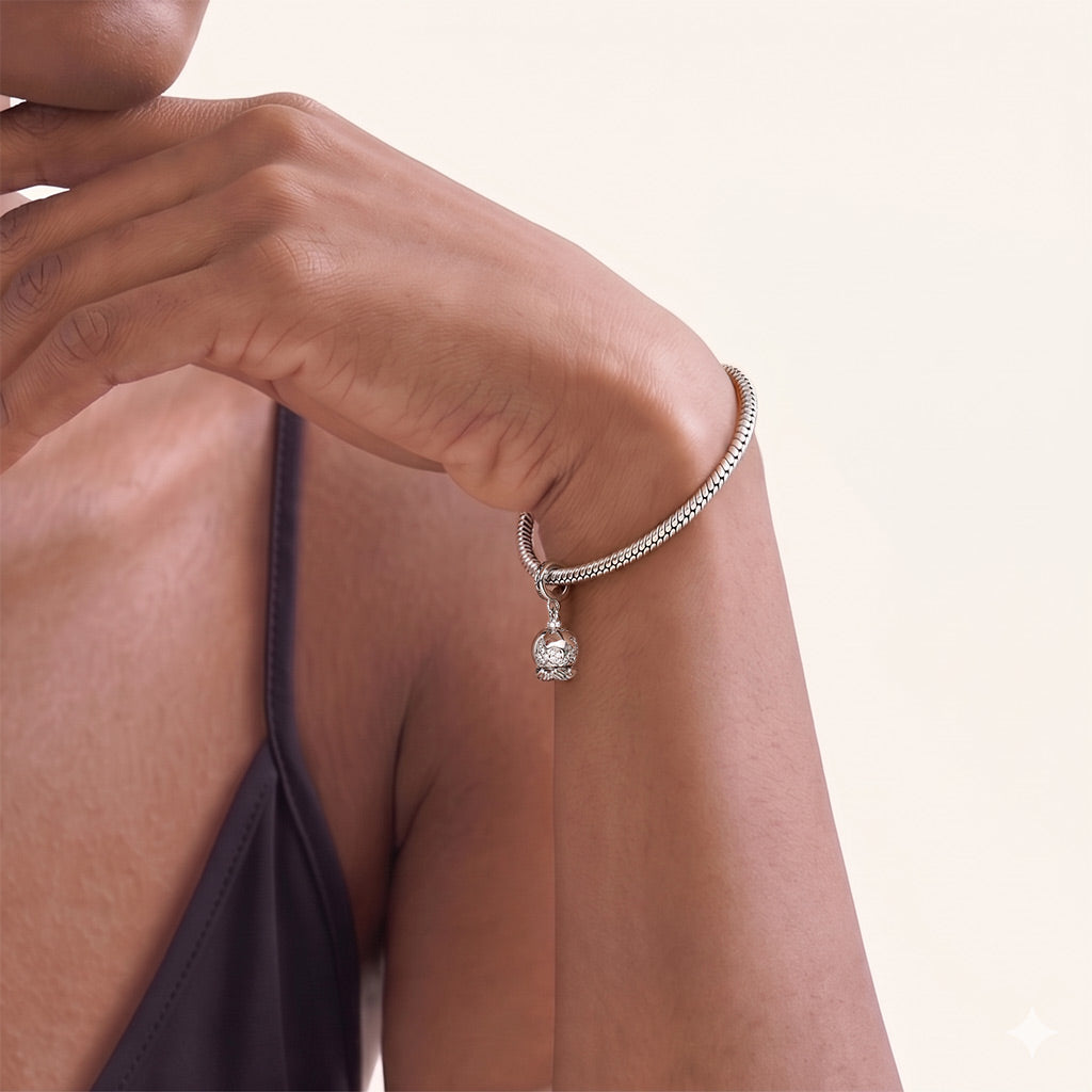 Gnoce Holding A Rotating Earth Charm Platinum-plated Silver Blend_5